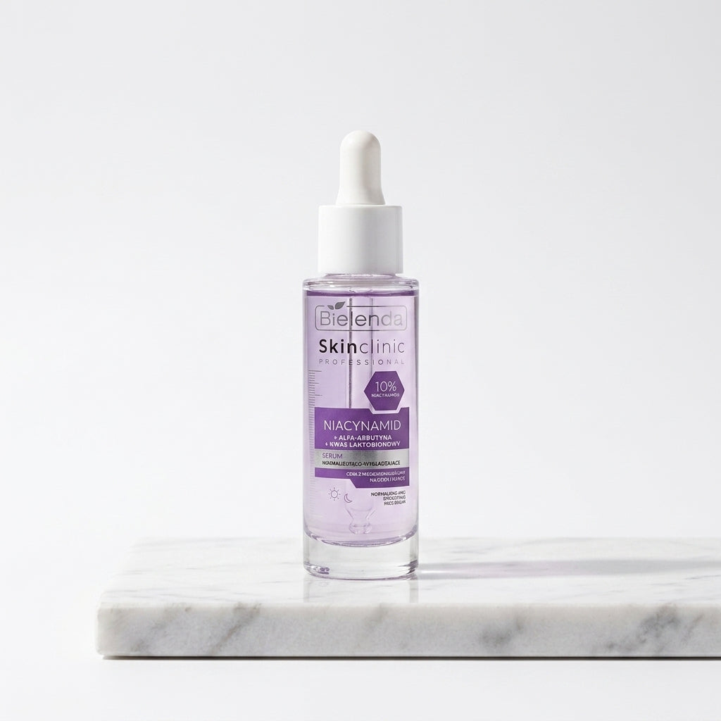 Bielenda Skin Clinic Professional Niacinamide Serum bottle standing on a grey-white marble slab