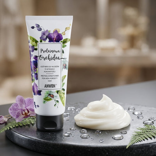 Close-up of cream texture next to Anwen Protein Orchid Conditioner tube