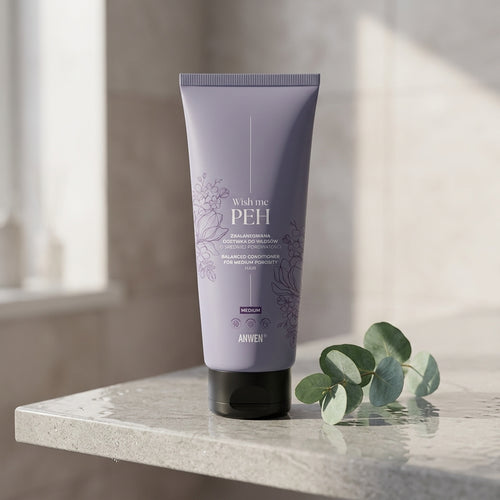 Anwen Wish me PEH Balanced Conditioner on a minimalist bathroom shelf with eucalyptus branch