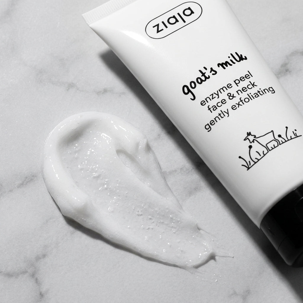 Creamy white texture of Ziaja Goat's Milk Enzyme Peel on marble