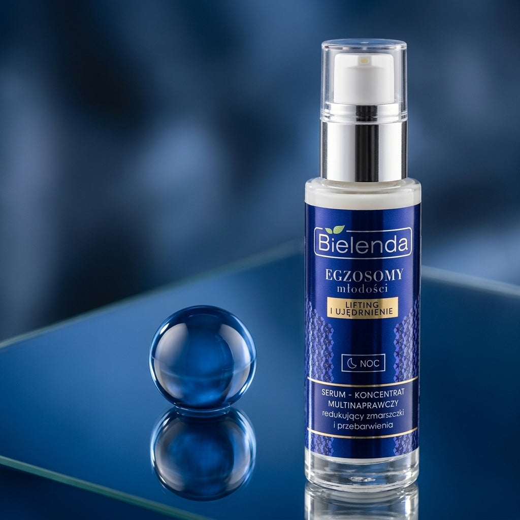 Close-up macro of Bielenda Exosomes of Youth Night Serum bottle with product droplet