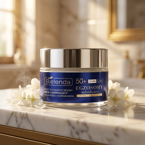 Bielenda Exosomes of Youth cream jar on a luxury vanity with white jasmine flowers in soft morning light