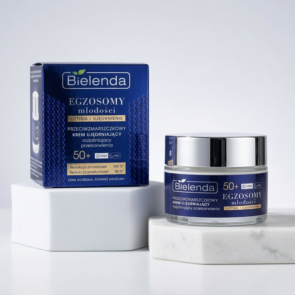 Bielenda Exosomes of Youth jar and packaging box displayed on minimalist white geometric podiums